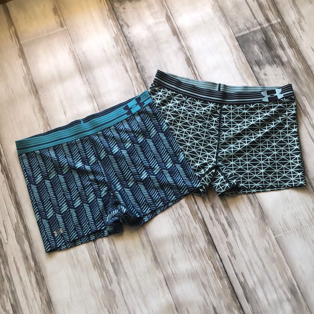 UNDER ARMOUR ATHLETIC SHORTS Two pairs/ geometric print Woman’s medium